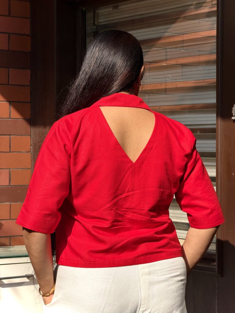Chic Red Tailored Top with Classic Ivory Pants