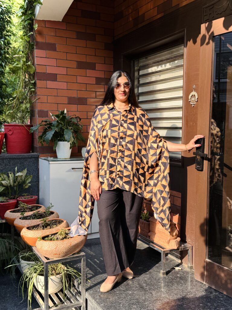Abstract Printed Flow Cape Shirt with Black Pants